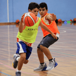 Non-competitive basketball leadership training for ages 9 to 12 helping kids prepare for high school social dynamics.