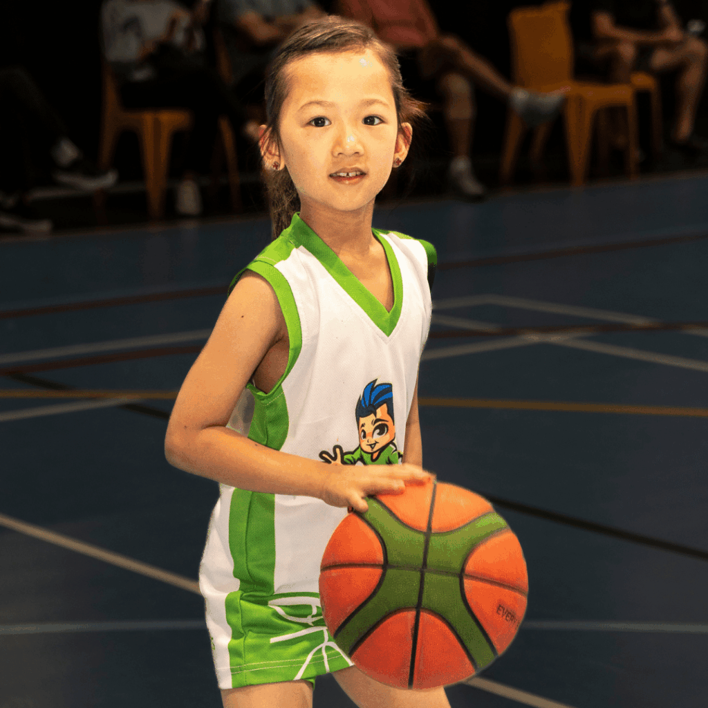Beginner kids basketball training during a school holiday basketball clinic