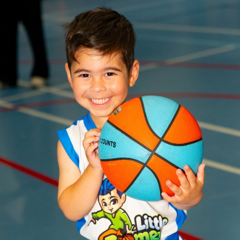 Smiling toddler participating in our 3-4 program